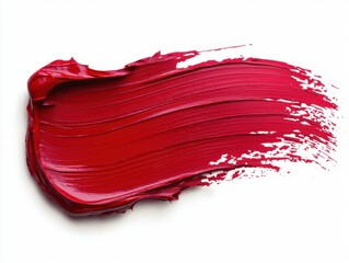 Vibrant crimson paint stroke on white canvas showcasing texture depth and artistic expression in studio light