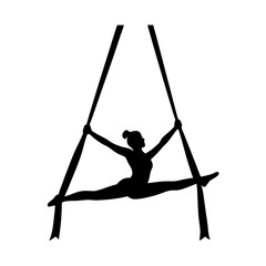Silhouette of a woman performing aerial and fitness exercises