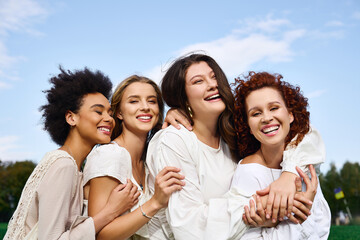 Friendship blossoms in fashionable spring attire during sunny outdoor adventure