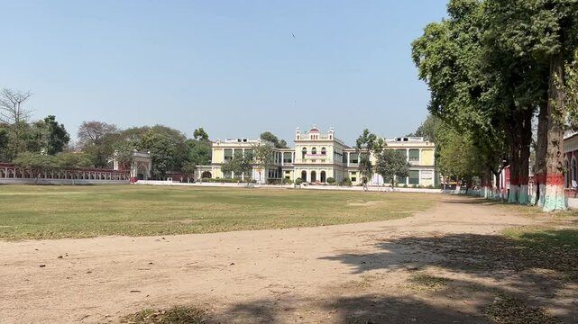 Patna University surrounded with greenery and tall trees in Bihar, India. Day view.