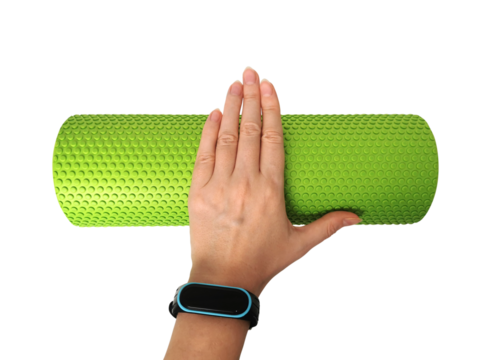 Hand on a green foam roller for fitness and muscle recovery