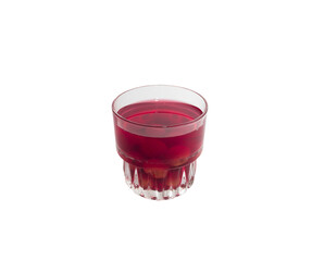 Sweet refreshing berry compote from ripe cherries in a glass isolated on white background.