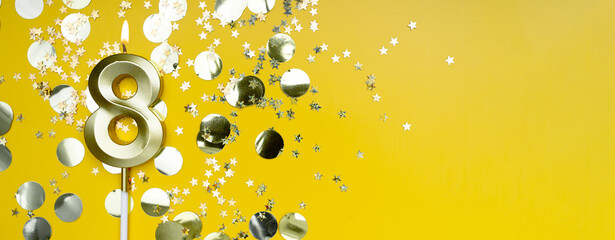 Golden candle number eight on yellow background. Birthday card with lettering 8. Anniversary concept. For birthday, new year celebration. Banner,
