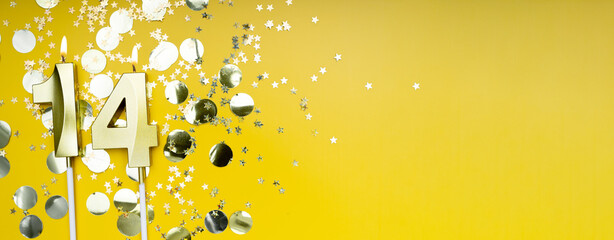 Golden candle number fourteen on yellow background. Birthday card with lettering 14. Anniversary concept. For birthday, new year celebration. Banner,