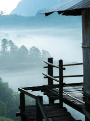 Bamboo Hut of Hill Tribe Village in Misty Morning, Doi Luang Chiang Dao, Thailand