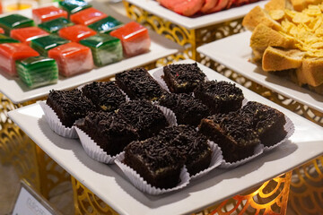 Traditional Indonesian Ramadan cake, captured on March 17, 2025. This sweet and fluffy treat is perfect for iftar, featuring rich flavors and a soft texture