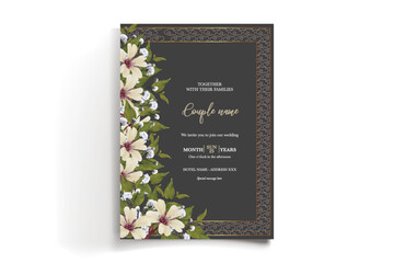 WEDDING INVITATION FRAME WITH FLOWER DECORATIONS AND FRESH LEAVES