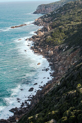 Atlantic Ocean. Aerial view of ocean waves and rocky coast. Rocky shore. Blue ocean. Sea waves. Travel destinations