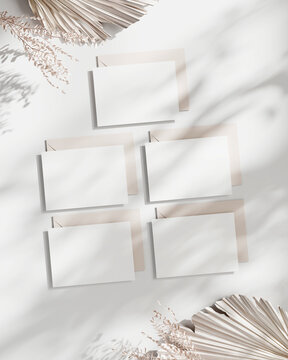 Five 5x7 Horizontal Cards Mockup with Envelope, Invitation Template, Paper Mockup, Greeting Card Mockup on White Background with Dry Plant Decor
