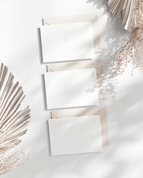 Three 5x7 Horizontal Cards Mockup with Envelope, Invitation Template, Paper Mockup, Greeting Card Mockup on White Background with Dry Plant Decor