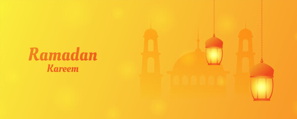 Ramadan Kareem banner, lantern and mosque silhouette
