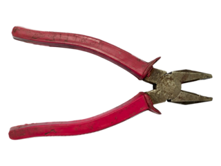 Closeup of weathered redhandled pliers on a white background. A symbol of hard work, resilience, and DIY projects. Perfect for illustrating concepts of repair, construction, or manual labor.