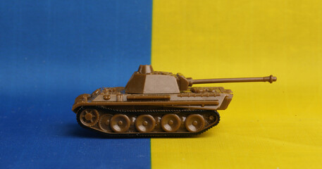 tank against the background of the Ukrainian flag.Concepts of war in Ukraine