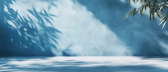Tranquil blue wall with shadows, ideal for modern design and relaxation themes.