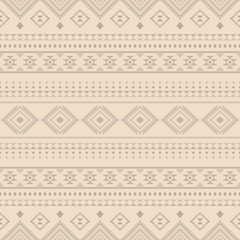 Aztec Navajo tribal Native American geometric seamless pattern. Colorful ethnic design for fabric, textile, blanket, rug, carpet, and fashion.