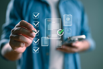 Businessman working with sign of the top service Quality assurance, Guarantee, Standards, ISO certification and standardization concept, Quality management with Quality Assurance and Quality Control.