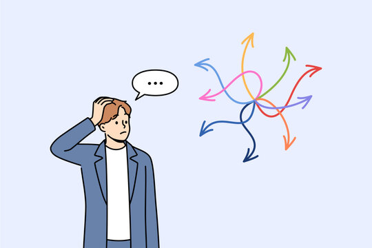 Business man is faced with difficult choice, feeling confused, looking at arrows pointing in different directions. Manager faces difficult choice due to lack of strategy for career growth