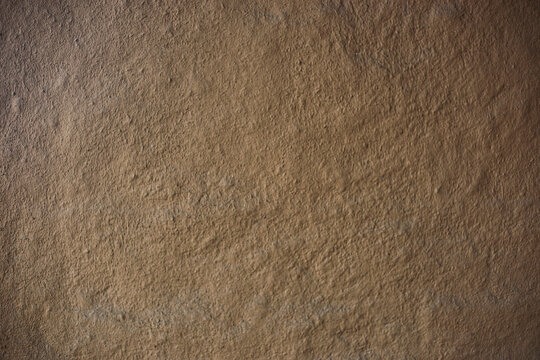 Texture of wall clay house structure, mud background