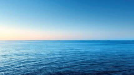 Obraz premium Beach waves landscapes concept. Serene ocean view with calm waves and a gradient sky at sunrise or sunset.