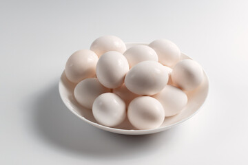 Close-up of white-colored chicken eggs.