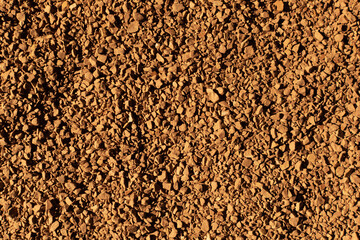 Instant Coffee Granules. Natural Coffee Beans Background.