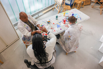 Disabled people in creative workshop