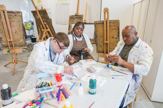 Disabled people in creative workshop