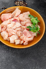 Chicken raw meat pieces of meat poultry tasty fresh delicious gourmet food background on table rustic food top view copy space keto and paleo diet