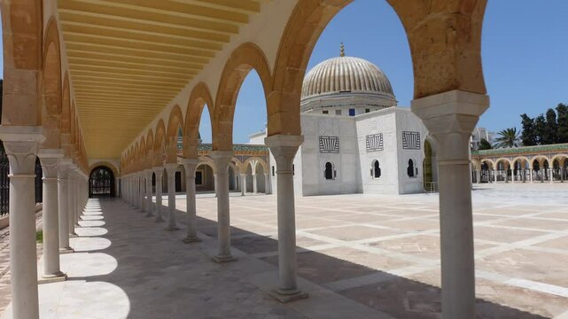 Tunisia historic landmarks and architecture, walking through arches of Mausoleum of Habib Bourguiba in Monastir
