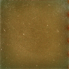 Blank grained film strip texture background with heavy grain, dust and light leak