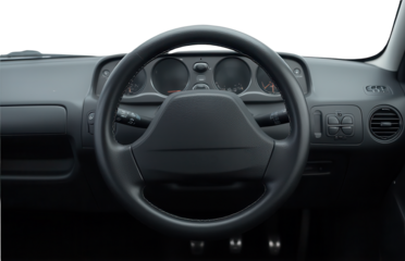 Close-up View of a Car Steering Wheel and Dashboard Interior Design