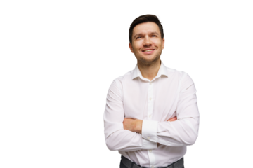 Business professional smiling confidently with arms crossed in a bright studio setting