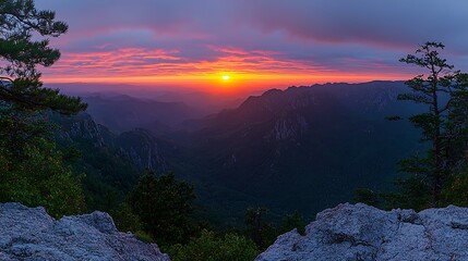 Mountain valley sunrise panorama from peak