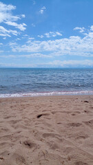 Quiet and calm lake shore on a sunny day, Kyrgyzstan