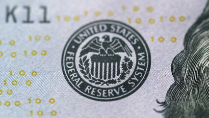 A closeup view showcasing the Federal Reserve Seal intricately featured on U.S. Currency