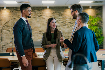 Businesspeople discussing new project in modern office