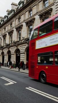 Vibrant doubledecker buses navigate bustling urban street amidst historic architecture