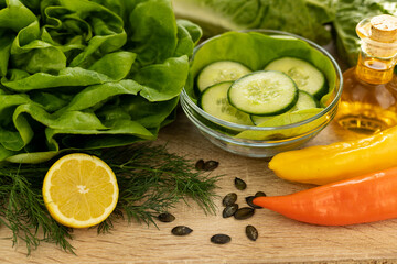 Vegetables from the garden. Ingathering. Making salad at home in the kitchen