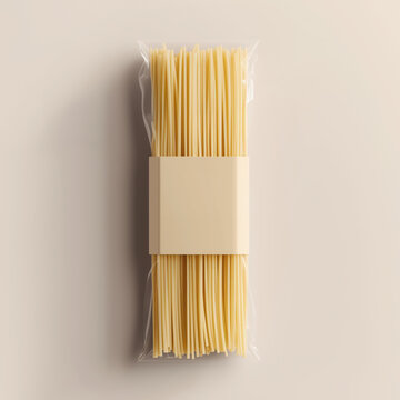 Spaghetti pack wrapped with blank beige label on white background