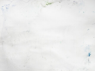 textured watercolor paper stained with paint