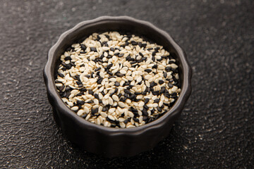 Sesame spice mix white and black tasty fresh gourmet food background on table rustic food top view copy space