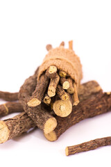 Licorice Root Sticks on White Background – Natural Herbal Remedy and Wellness Concept







