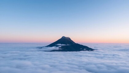 Majestic Mountain Peak above the Clouds at Dawn