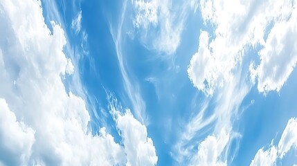 Beautiful azure blue sky with fluffy white clouds in view