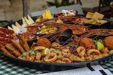 seafood on a plate - sample food in a restaurant in Suracuse, Sicily	
