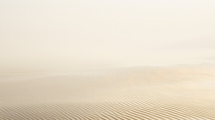 Desert Sands: Capturing the stark beauty of the desert landscape, with rippling sand dunes under a soft, hazy sky.