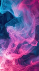 Obraz premium Colorful swirling smoke creates an enchanting visual display in shades of pink and blue