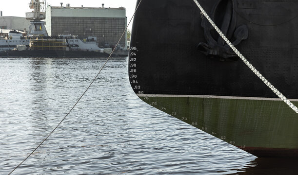 Closeup view of a icebreaker ship bow showing anchor, draft marks