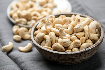 Cashew nuts in bowl closeup view