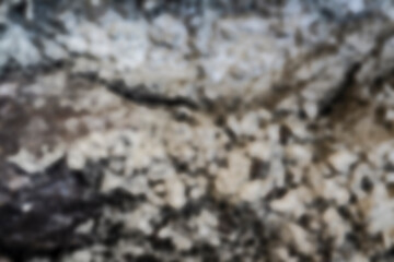 Blurred abstract background with earthy brown and beige tones. Soft defocused texture for design and overlay.